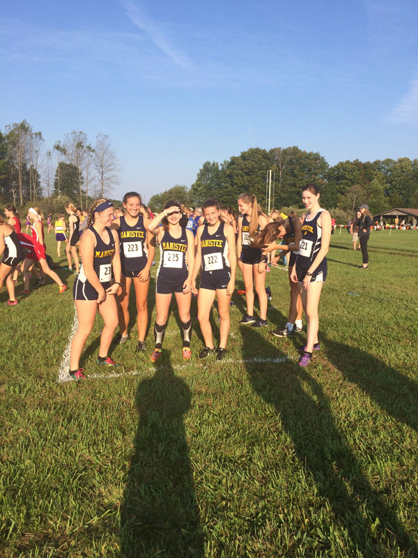 Manistee Chippewas Boys and Girls Cross Country Team on course running