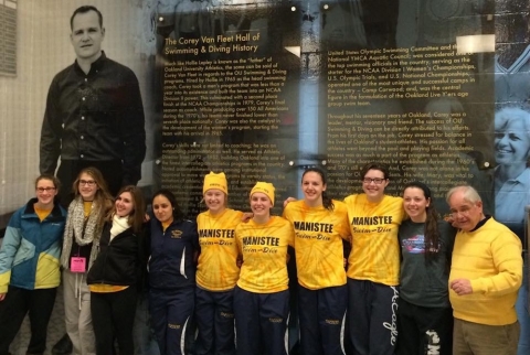 Corey Van Fleet and swim team members at Oakland University dedication