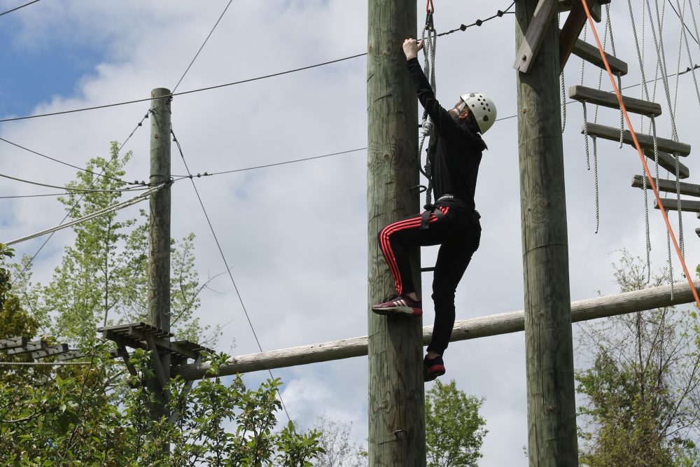 Student climbing at Adventure Learning