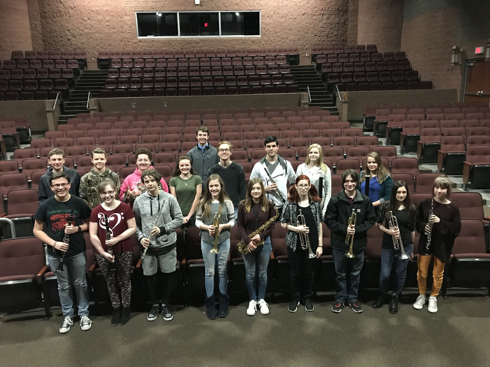 band students posing in auditorium