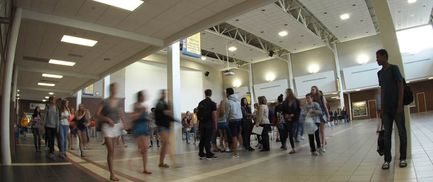 students walking through commons