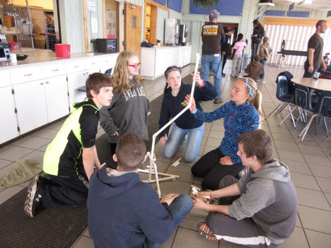 Students building project together