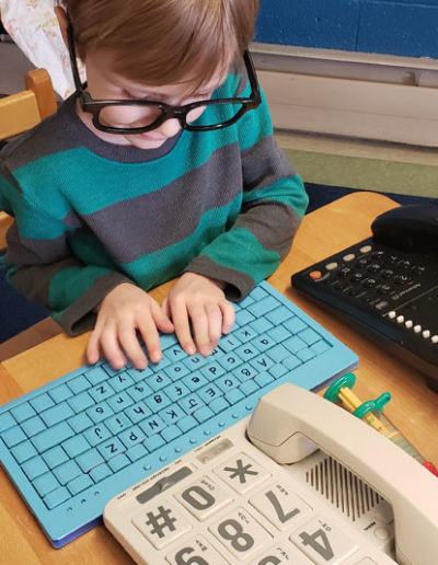 Boy using keyboard