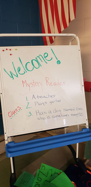 Welcome Mystery Reader sign