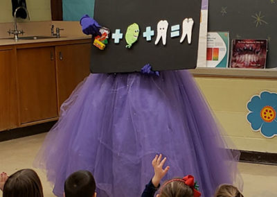Tooth Fairy reading with students