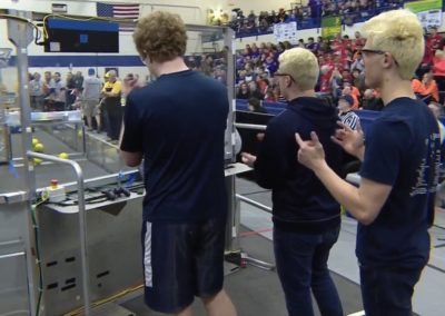 Students competing at robotics tournament