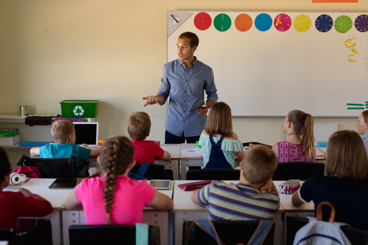 Teacher in front of classroom